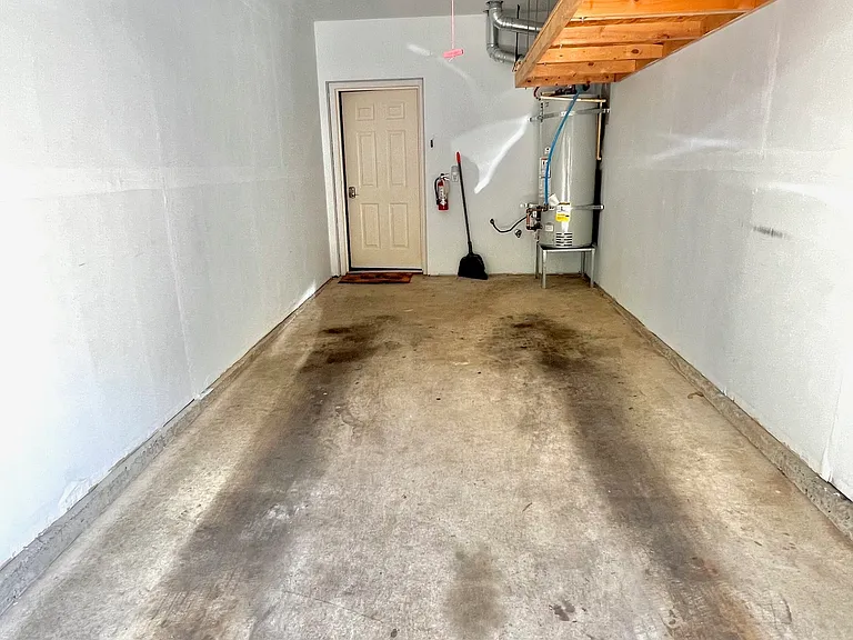 Attached garage with hanging storage space