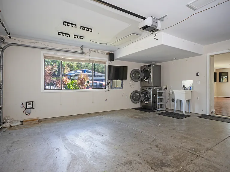 Spacious, Enclosed 520 Square Foot, 2-Car Garage with Split AC Unit for Your Home Workouts! High Efficiency Washer and Dryer!
