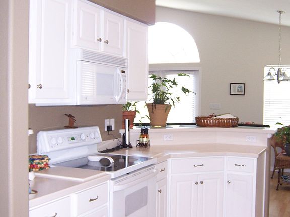 Spacious kitchen with bar for extra seating