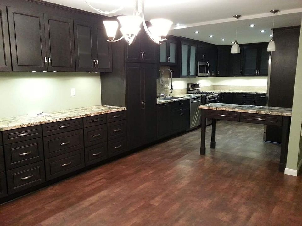 Kitchen and dining area; easy close cabinets and Brazilian granite