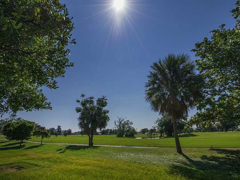Recently renovated & painted 4 BD/ 2.5 BA pool home on gated Normandy Island!