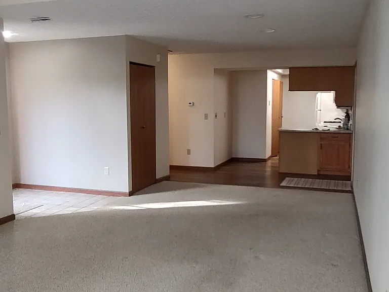Living room to dining area to kitchen view