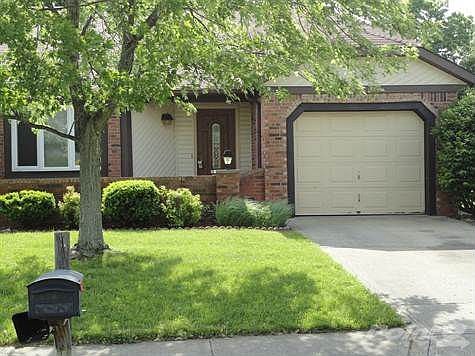 Front of charming attached home.