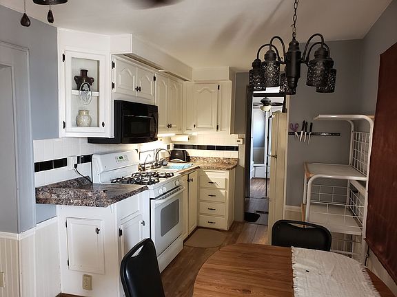 2nd image of 13827 E 49th St #B