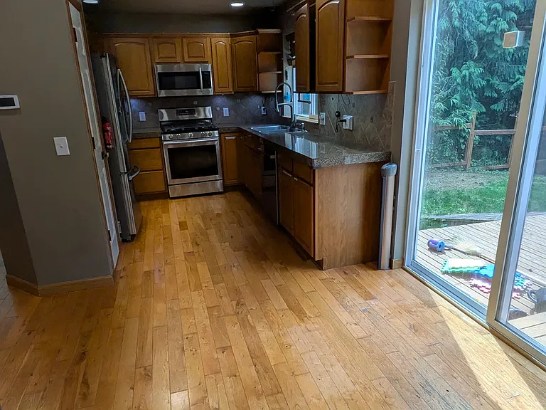 Without island. Kitchen island can be removed