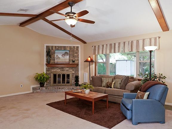 Vaulted ceilings and plenty of natural light to your awesome back yard.