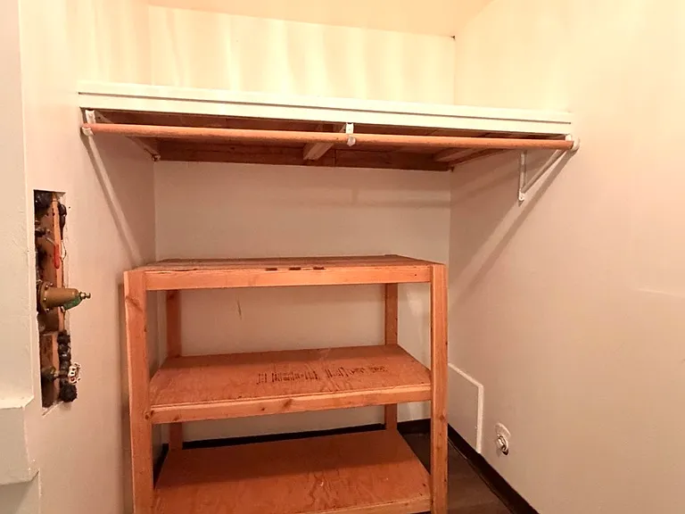 Storage shelves space in the laundry room