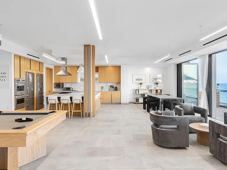 Large, luxurious kitchen space with high end finishes throughout