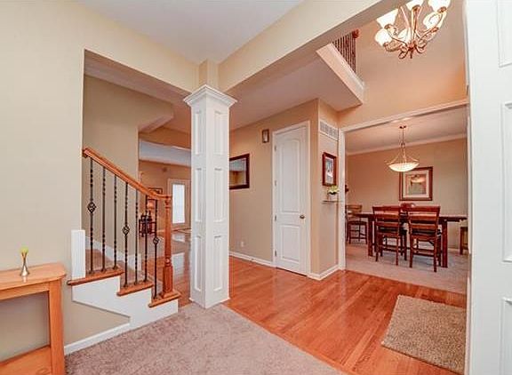 The entry way is hardwood floors.
