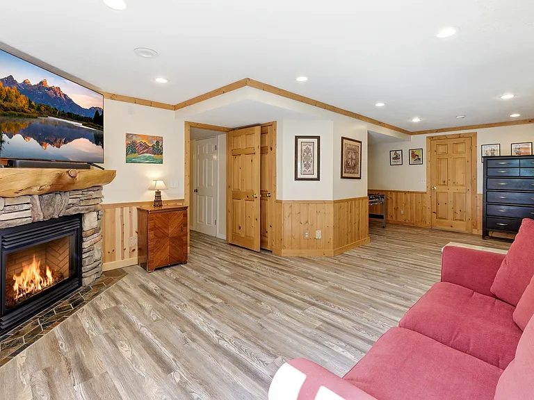 Spacious walkout basement living area with direct access to the backyard.
