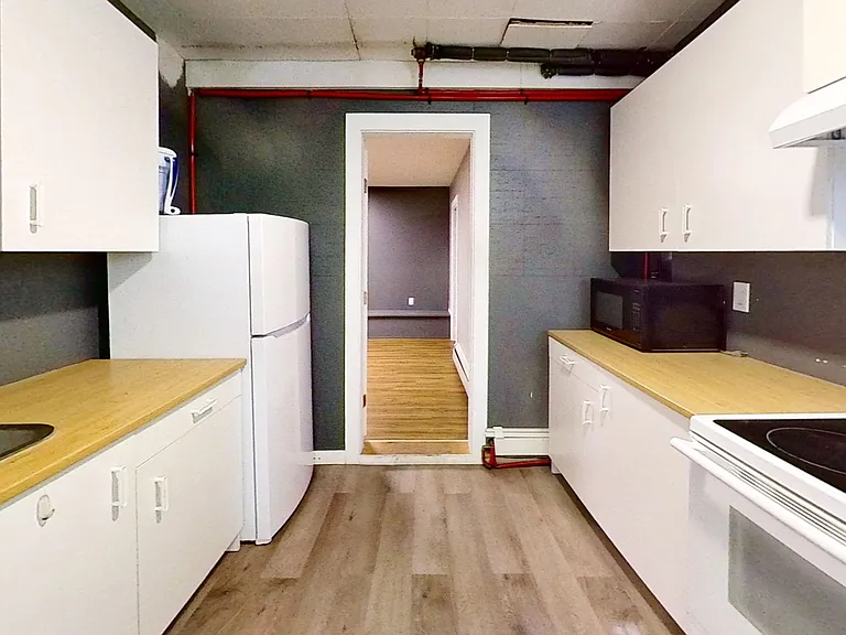 720 W 54th Ave — Photo 1