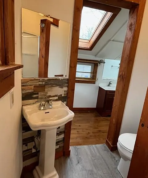 Shower room w/entry to Jacuzzi Room w/warm hardwood flooring