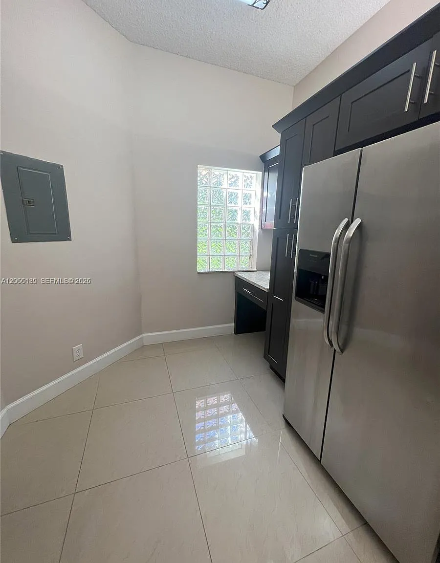 Optima Village I-C Condo — Photo 4