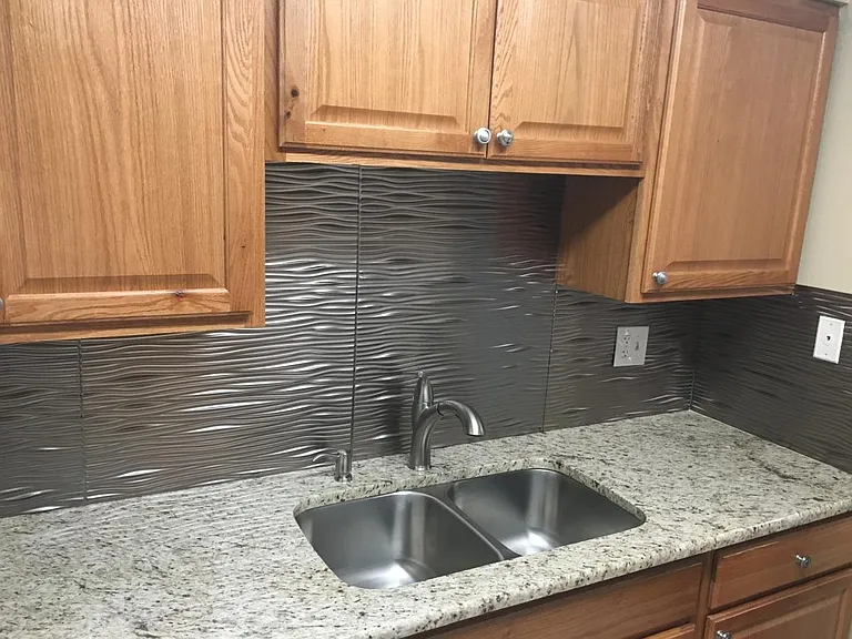 Kitchen with Granite tops and backsplash