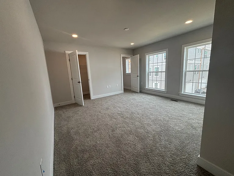 Master Bedroom with His and Her walk-in closet