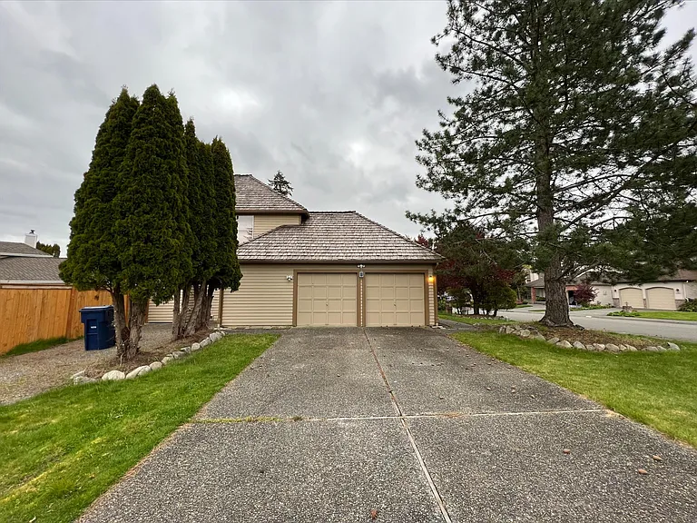 garage with long drive way