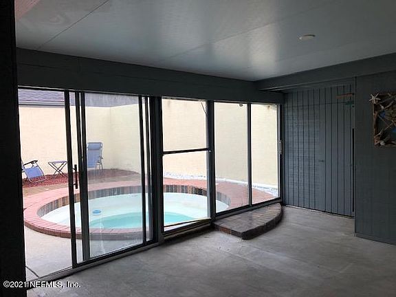 Glassed in Porch to Pool