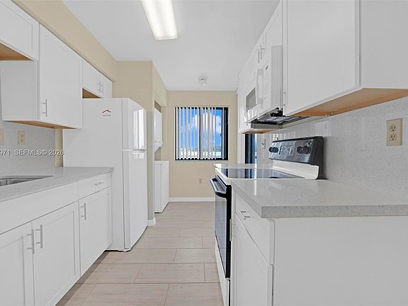 4th image of 15545 Miami Lakeway N APT 106