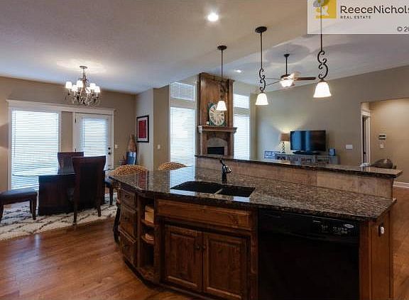 This kitchen also boasts a huge walk-in pantry, and leads to the
