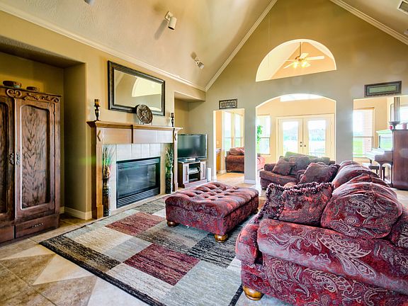LR, fireplace, wet bar, open