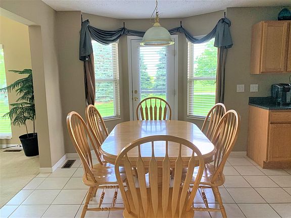 Breakfast room with a walkout to the patio! Enjoy sitting here in the morning eating breakfast!