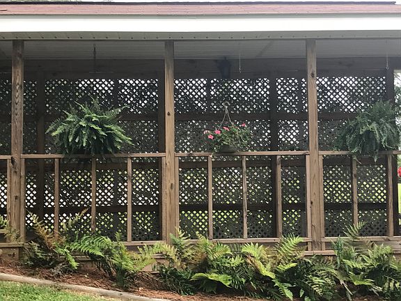 Bridge to house from carport