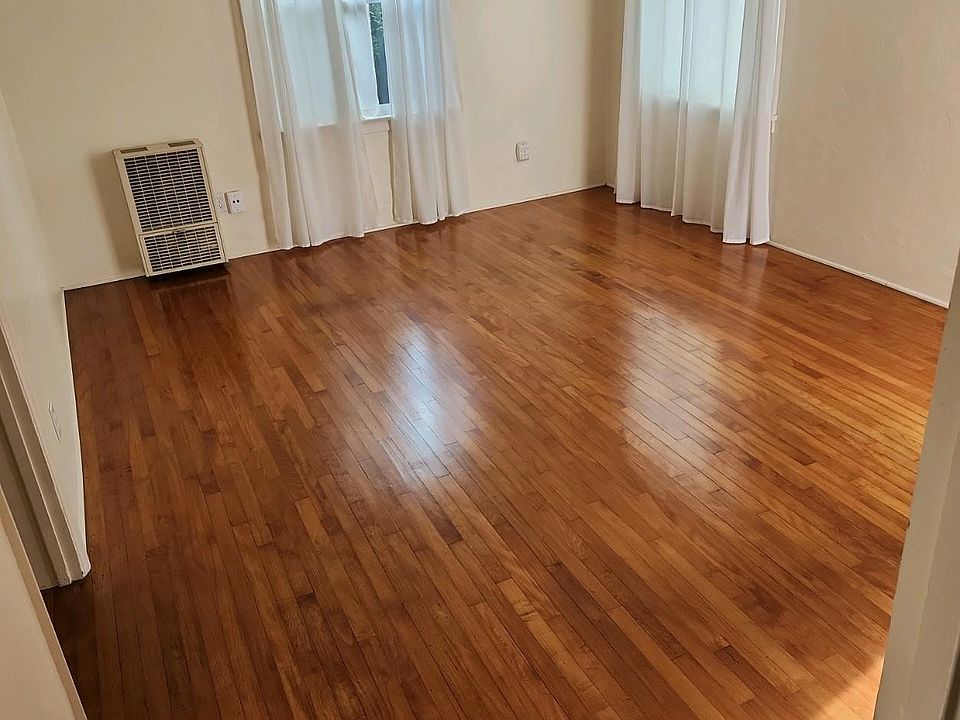 Living Room, American Cherry Hardwood floors, recently refinished, new paint, curtains