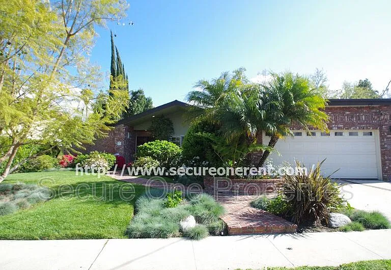 23338 Los Encinos Way — Photo 1