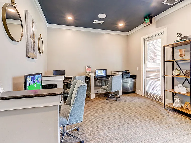 Business center with complimentary wifi, computers and printers.