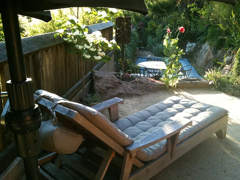 Lounging area in front of Studio overlooking trampoline area; outdoor furniture similar to this image
(brown jordan lightweight chaise/chairs/table)