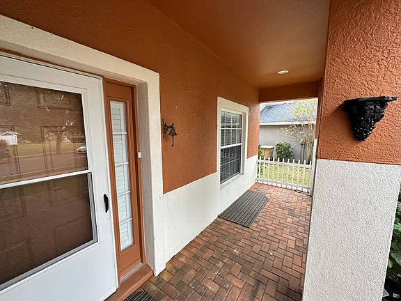 Extended, paved front porch. Perfect for a peaceful morning beverage on rocking chairs