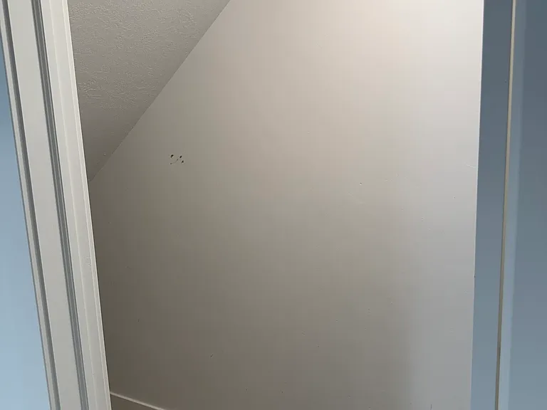 Small storage under stairs