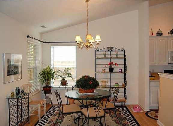 12x8 breakfast room is adjacent to the kitchen and screened porch. 