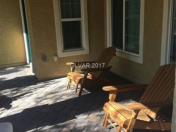 Front porch; so inviting. Your view across the street is NOT of another house. NO! You can sit and w