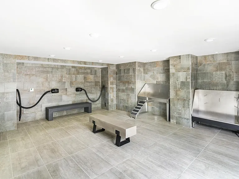 Pet spa with washing stations and grooming areas designed for your four-legged friends at Modera LoSo.