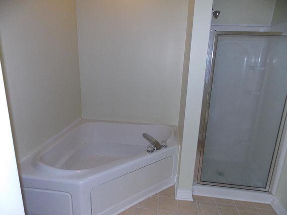 Bright and airy garden tub