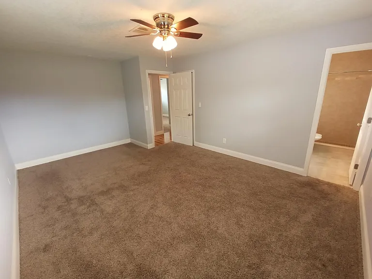 Master bedroom with ensuite bath (large closet added in renovations) (view 1)