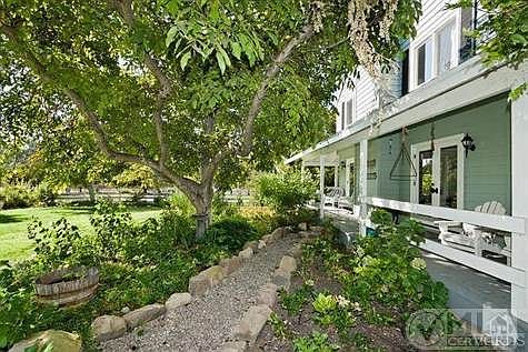 Who DOESN'T love a Country Farmhouse with a romantic wrap`around porch!