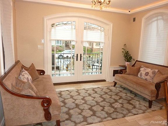 FRENCH DOORS TO FRONT PORCH...