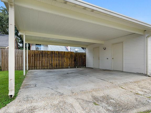 Covered Parking, utility closet and storage shed