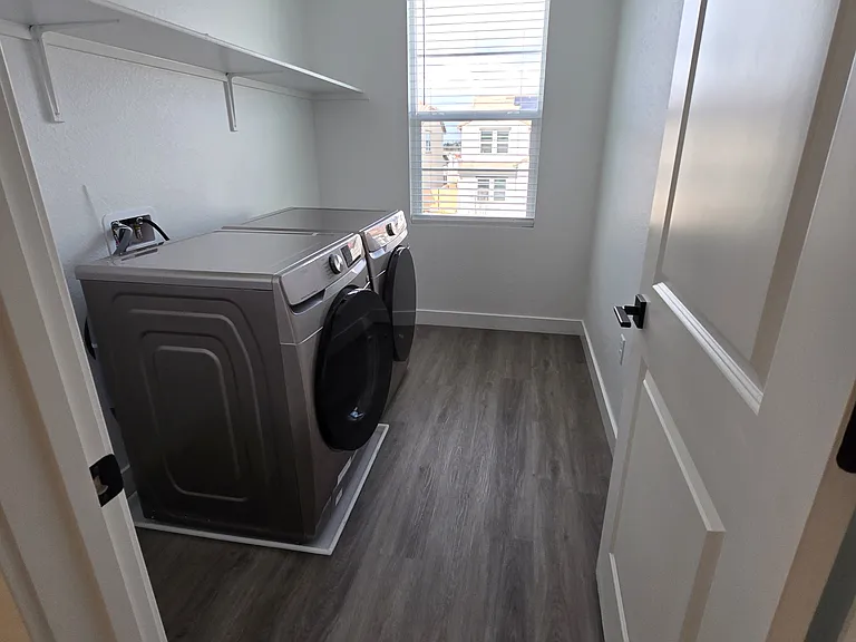 Laundry room with brand new Washer/Dryer