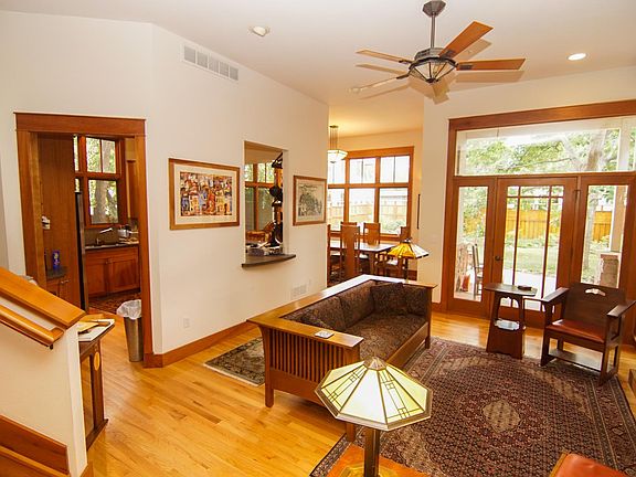 Main floor living area: Living Room, Dining Room, Kitchen, Looking out on fenced back yard