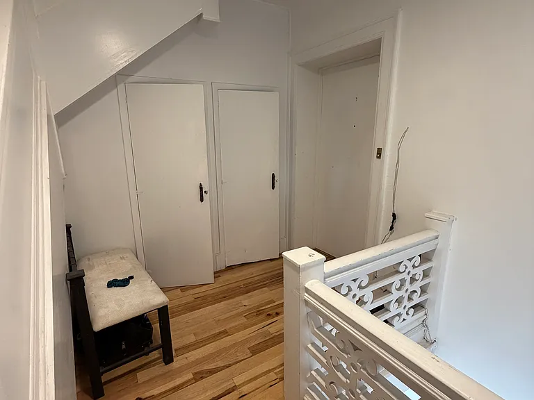 Entry area - front door is on right. Additional storage areas.