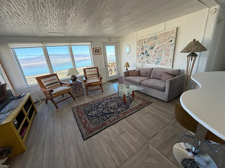 Living room with lake and mountain view