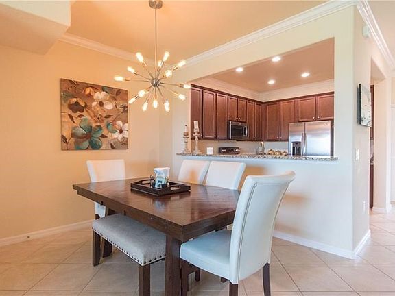 Dining room with breakfast bar to the kitchen.