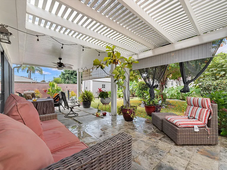 Looking towards backyard from covered seating area