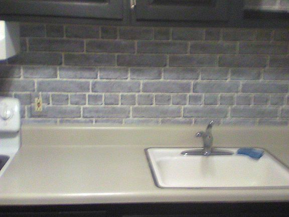 KITCHEN COUNTERTOP AND BACKSPLASH