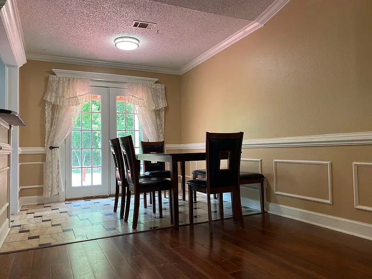 Bright and inviting dining area with plenty of space for family dinners, holiday gatherings, and entertaining guests