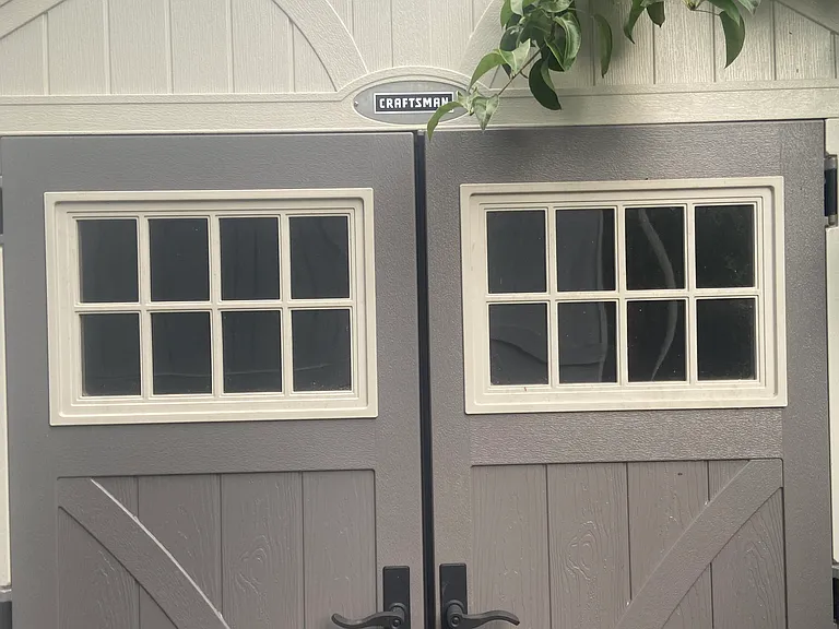 Locking storage shed in back yard