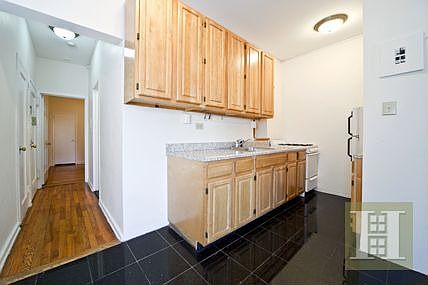 3rd image of 212 E 13th St APT 3A
